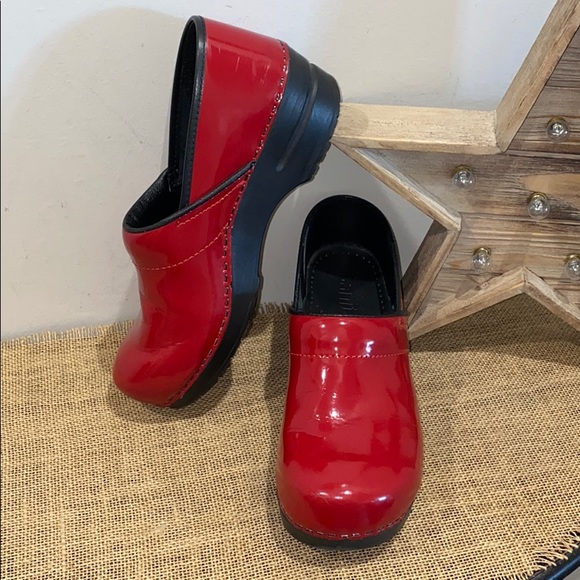 sanita red patent clogs
